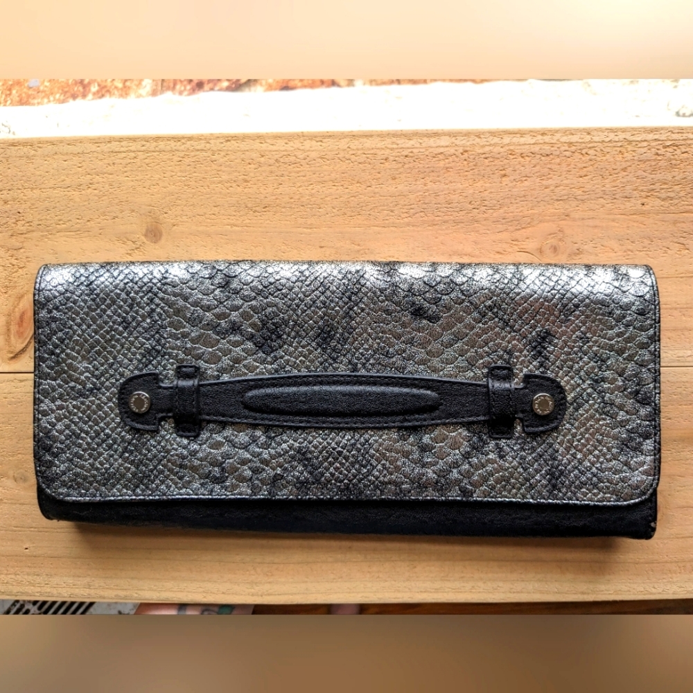 Kenneth Cole Reaction Clutch